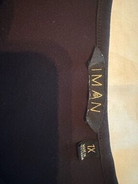 IMAN Black Crewneck Top with Gold Logo Threading